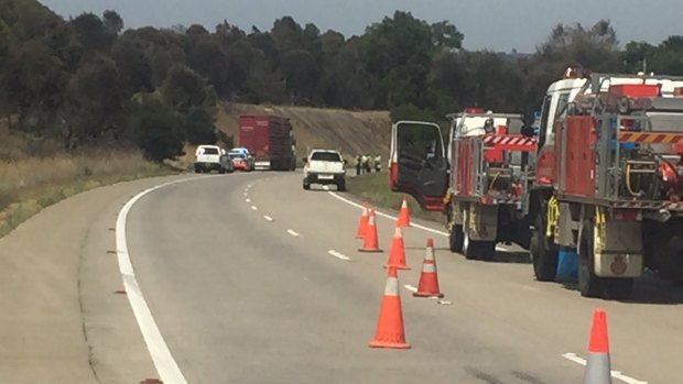 A woman has died after a two-vehicle collision south of Gunning, near Oolong Road.