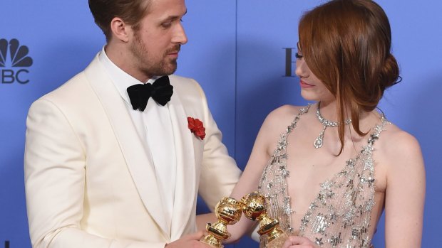 Ryan Gosling and Emma Stone after winning Golden Globes for <i>La La Land</i>, which received 14 Oscar nominations. 