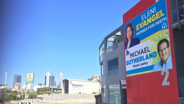 The two Liberal Party billboards that grace the building owned by Lisa Scaffidi and her husband.