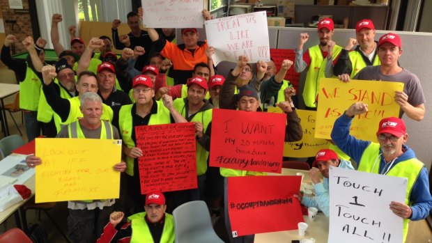Workers protest from inside the lunchroom at the Dandenong factory.