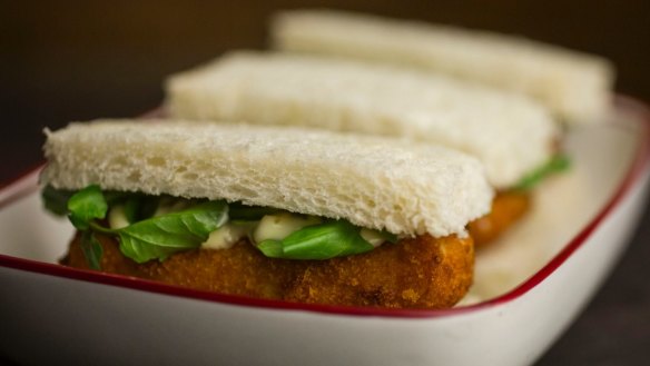 Great with a G&T: a trio of fish finger sandwiches at The Duke of Clarence.