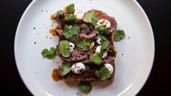 Lamb heart iskender, grilled, thinly sliced and served on bread.