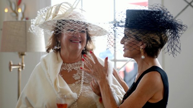 Gina Rinehart and Julie Bishop in the Emirates marquee at the Melbourne Cup. 