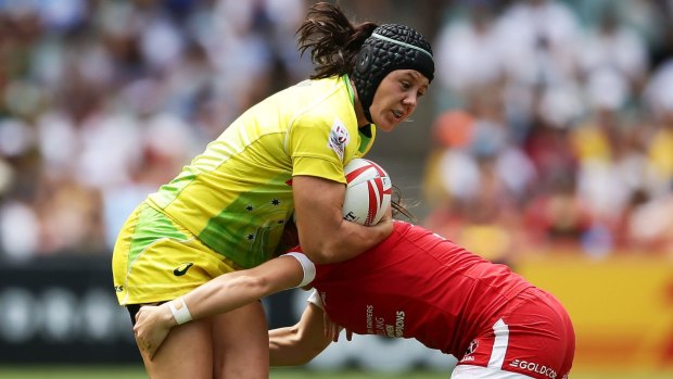 Keen for the 15-a-side: Sharni Williams is tackled during the Sydney Sevens.