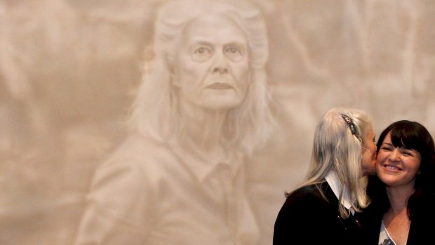 Subject Penelope Seidler congratulates Fiona Lowry on her 2014 Archibald Prize win.