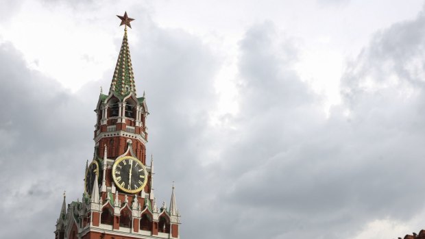 The Kremlin clock sits on the Spasskaya tower on Red Square in Moscow, Russia.