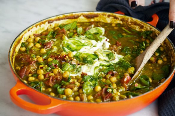 Yoghurt and coconut milk make this spinach and chickpea curry nice and creamy.