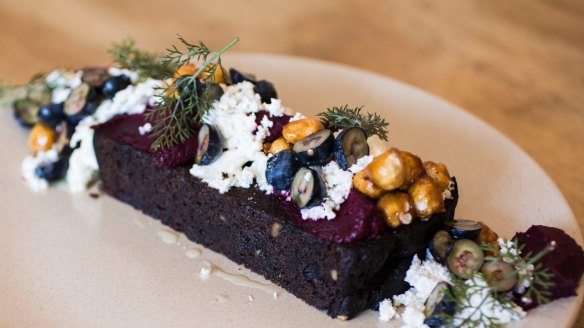 The beetroot bread is dense, semi-sweet, a little dusty and dressed up with slashes of beetroot puree, a ricotta-ish buttermilk curd and sprigs of dill.