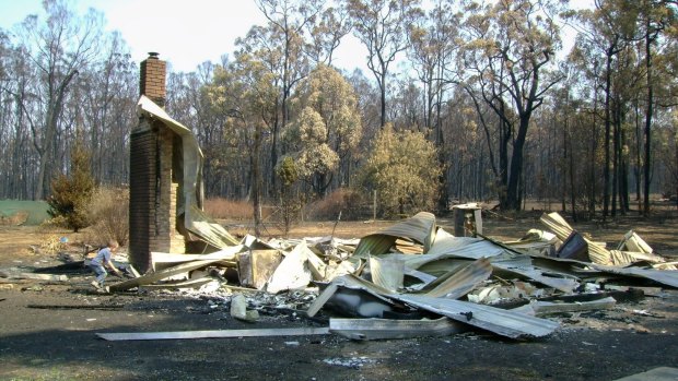 A burnt-out property near Toolangi, Victoria, after the Black Saturday fires in April 2009. The Australian Defence Force provided large-scale relief.