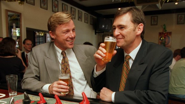 Former Victorian ALP politicians John Brumby and John Thwaites raising a glass at the Imperial.