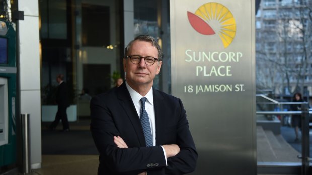 Suncorp managing director Michael Cameron concedes climate change is happening, but has not clarified if he believes it is caused by humans.
