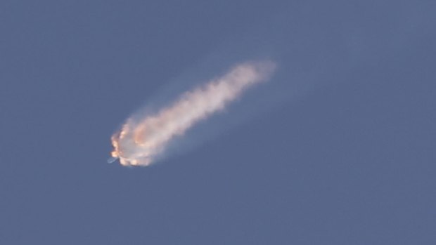 The SpaceX Falcon 9 rocket and Dragon spacecraft breaks apart shortly after liftoff.