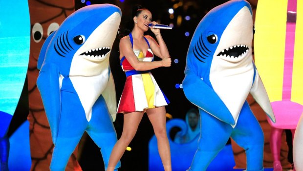 Katy Perry performs with her left and right shark during the 2015 Super Bowl.