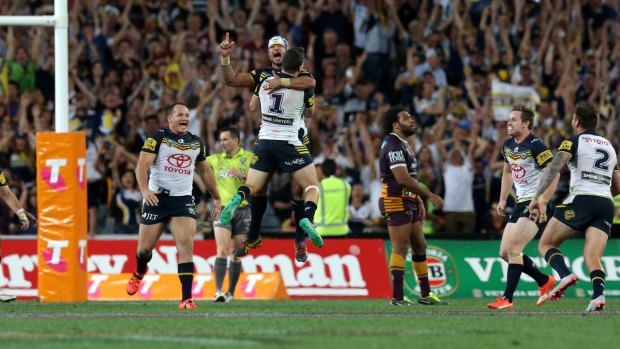 Greatest show in town: the Cowboys celebrate winning the 2015 NRL grand final. 