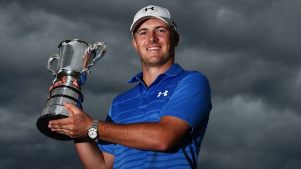 Heading back: Jordan Spieth poses with the Stonehaven trophy after winning the 2014 Australian Open.
