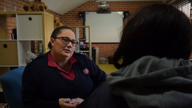 The Salvation Army Community of Hope co-ordinator Kim Taylor (left) talks with Jane Hill*, who has fallen on hard times after a car accident.