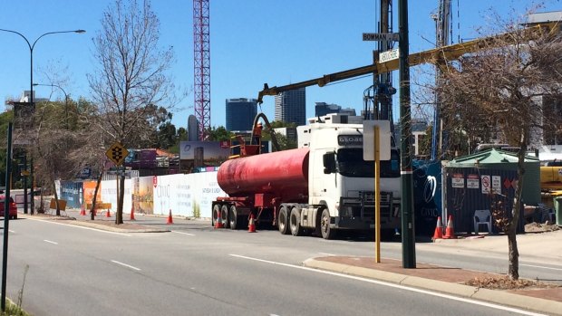 Dewatering trucks are now a regular feature of the busy stretch of road. 