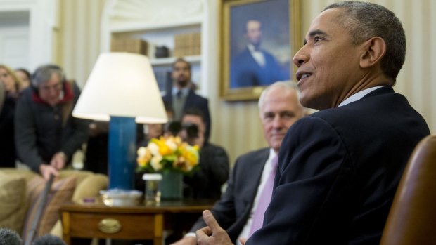 US President Barack Obama, right, speaks while meeting with Malcolm Turnbull in the White House.