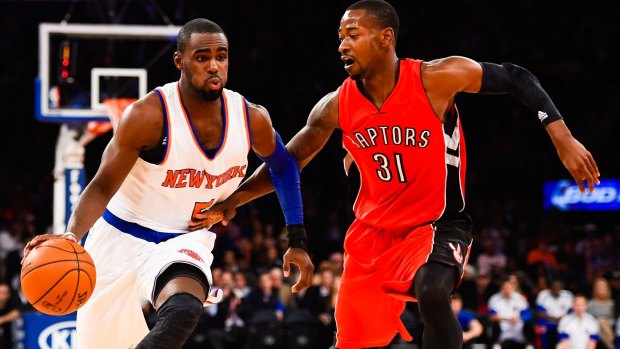 New system: Knicks guard Tim Hardaway jnr tries to get past Toronto's Terrence Ross.