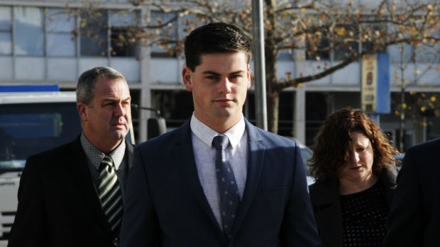 ADFA cadet Jack Toby Mitchell, second from left, arrives at the ACT Supreme Court with his parents last week.