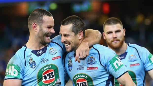 Comrades: Cordner and Mitchell Pearce celebrate the Blues defeat of the Maroons after game two in Melbourne in 2015.