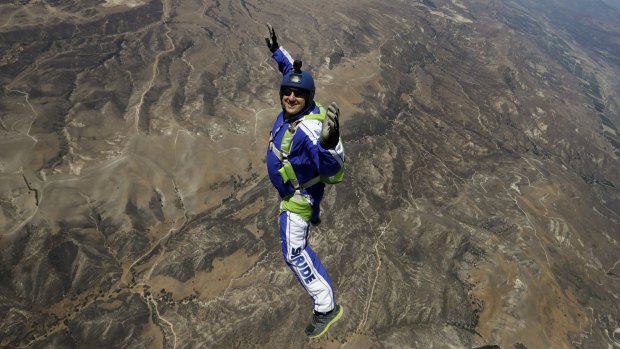 Skydiver Luke Aikins jumps from a helicopter during training in Simi Valley, California. 