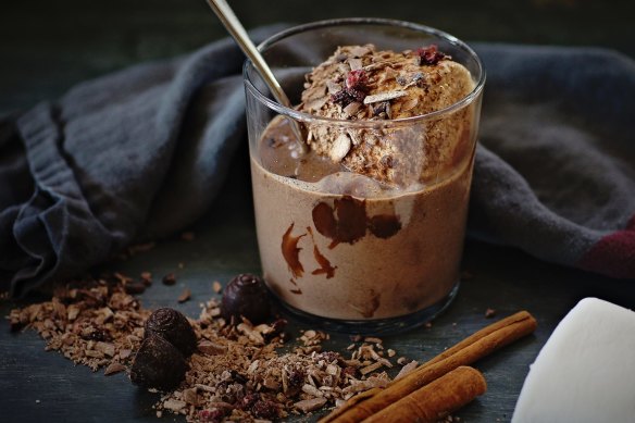 A jumbo marshmallow bobbing in spiced hot chocolate.