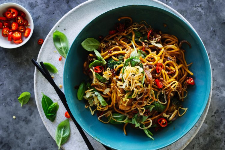 Stir-fries, like Adam Liaw's chicken and broccoli hokkien noodles, make great midweek meals. 