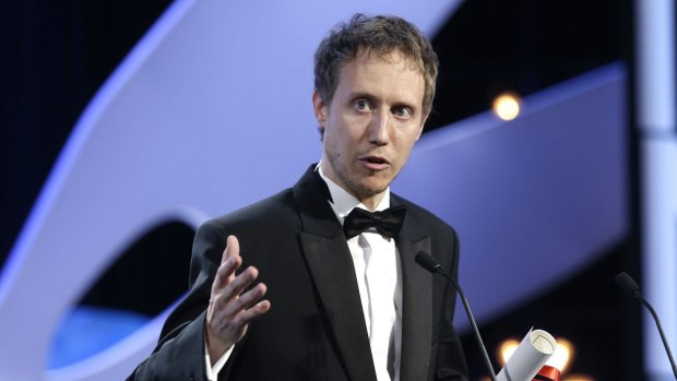 Director Laszlo Nemes holds the Grand Prix award for ''Son of Saul'' during the Cannes Film Festival.