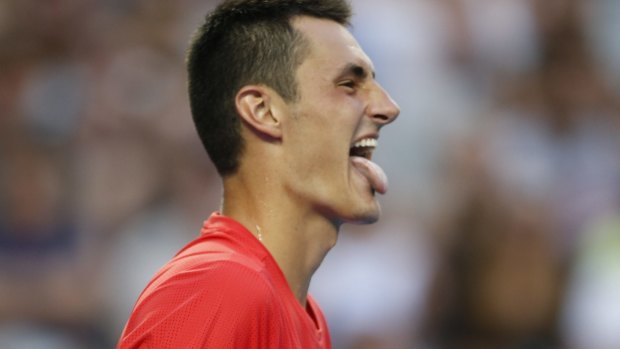 Bernard Tomic in action against Denis Istomin.