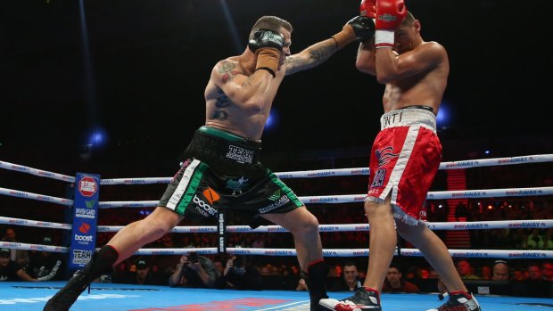 MELBOURNE, AUSTRALIA - AUGUST 19:  Daniel Green of Australia fights Roberto Bolonti of Argentina fights during the Cruiserweight bout at Hisense Arena on August 19, 2015 in Melbourne, Australia.  (Photo by Robert Cianflone/Getty Images)