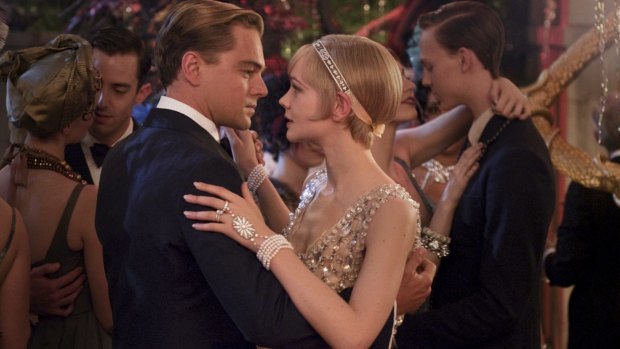 Leonardo DiCaprio as the ultra wealthy Jay Gatsby and Carey Mulligan as Daisy Buchanan in <i>The Great Gatsby</i>.