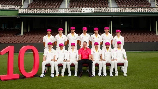 Glenn McGrath (centre) with the Australian Team in their baggy pinks, celebrating 10 years of the Sydney Pink Test.