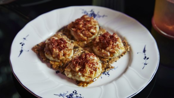 Kingfish crackers with eggplant and Aleppo pepper.