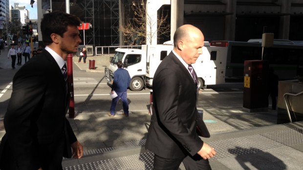 Alex Silvagni and Chris Bond arrive at the tribunal hearing.