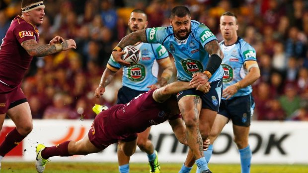 Colossus: Fifita charges into the Queensland defence.