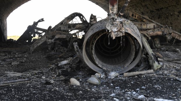 The aftermath: A plane burned as a result of the US missile attack on an air base in Syria.