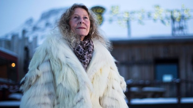 Mary-Ann Dahle, one of the colourful residents of Svalbard in Norway, sports her  polar bear coat.