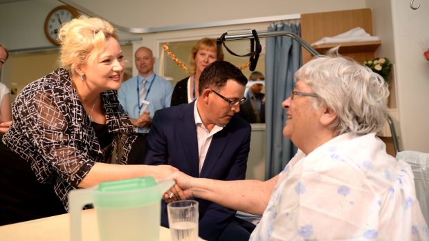 Victorian Premier Daniel Andrews and Health Minister Jill Hennessey chat with patient June Maher at Frankston hospital during a tour in December 2014.