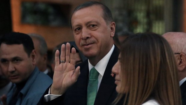 Turkish President Recep Tayyip Erdogan arrives at Parliament in Ankara on Friday.
