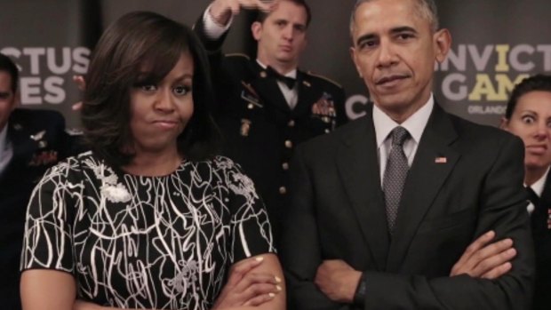 Trash talk: The Obamas told Harry to be 'careful what you wish for'.