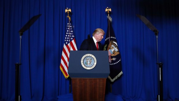 US president Donald Trump walks from the podium after announcing his military's air strikes against Syria.