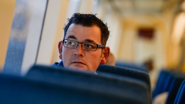 Ticket to ride? Premier Daniel Andrews checks out the journey to Waurn Ponds.