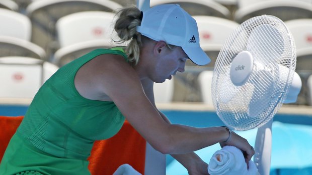 Fan favourite: Caroline Wozniacki tries to keep cool at the Sydney International.