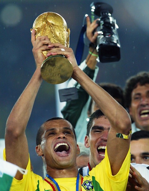 Rivaldo lifts the trophy after Brazil's 2002 World Cup triumph.