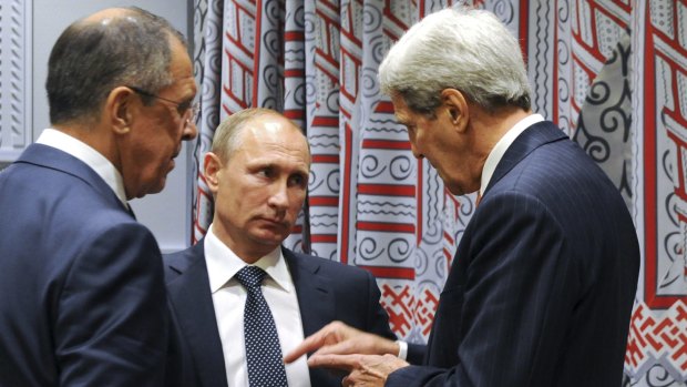 Russian President Vladimir Putin (centre) and Foreign Minister Sergey Lavrov, listen to US Secretary of State John Kerry at the UN earlier this week.