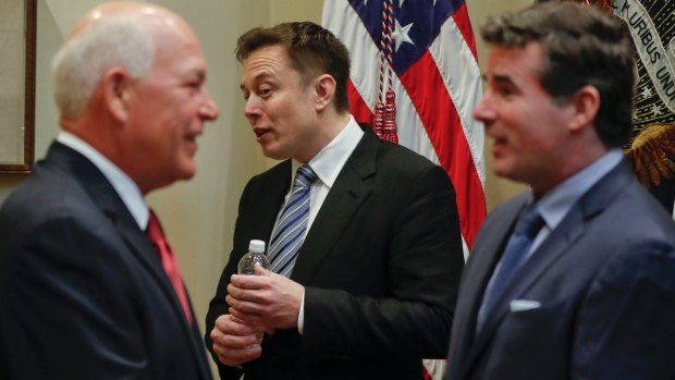 From right, Under Armour CEO Kevin Plan, CEO of Tesla Motors Elon Musk and Jeff Fettig, CEO of Whirlpool at the White House in January.