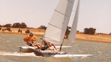 Robin Collins sailing on a championship-winning catamaran that he built.