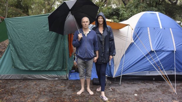 Wild weather: Matt and Elinore Martel at their campsite at Green Patch in Jervis Bay.