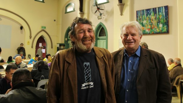 The Reverend Bill Crews, right, with a homeless man at The Exodus Foundation in Ashfield in 2013.
